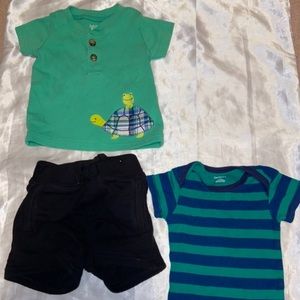 1 baby onesie and 1 outfit